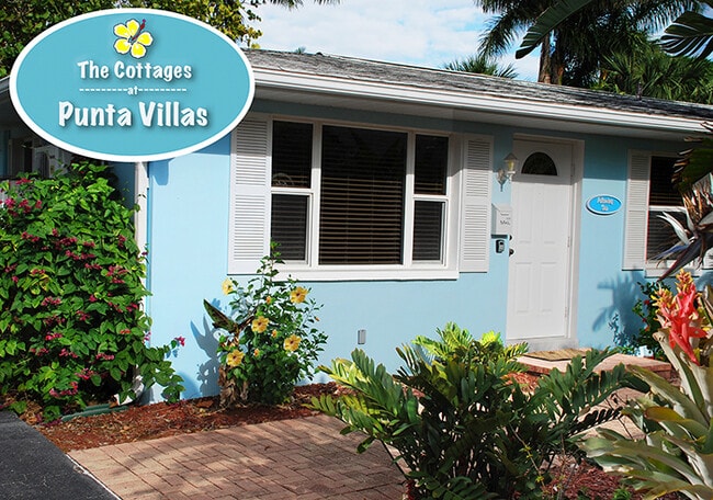 Tropical landscaping with front patios - The Cottages at Punta Villas