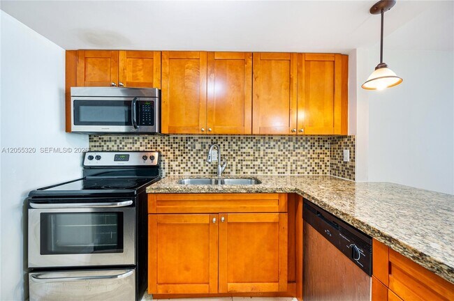 Photo - 601 Three Islands Boulevard Unit 112