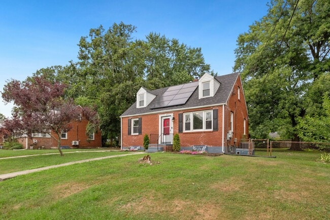 Building Photo - Move-In Ready Cape Cod with 3 Finished Levels & Huge Backyard
