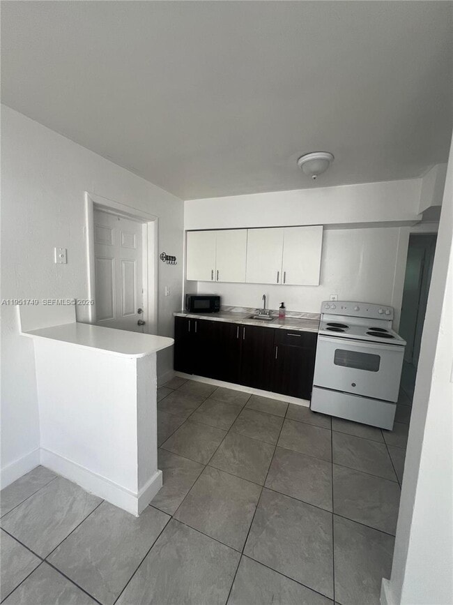 Building Photo - 16031 NE 18th Pl Unit 1B