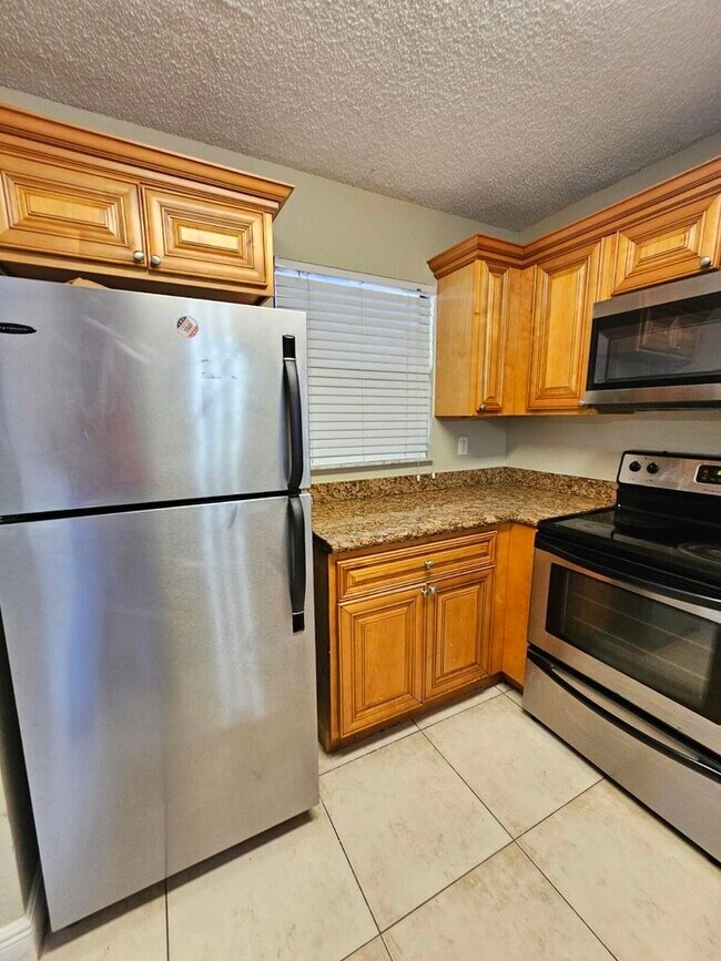 Photo - 1520 Windorah Way Unit H