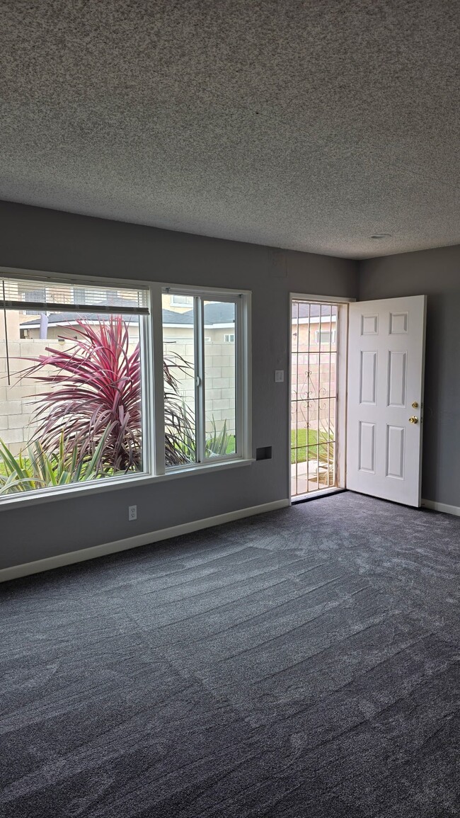 Building Photo - 17030 Woodruff Ave Unit 17030