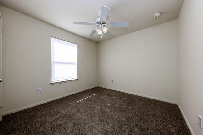 Bedroom with carpet - LaFollette Estates