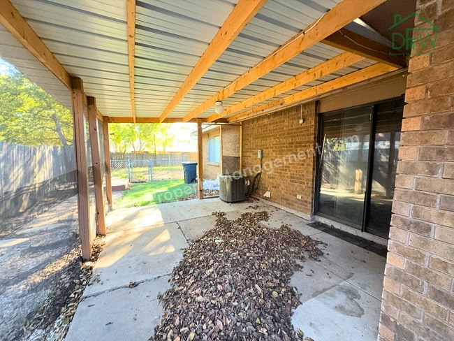 Photo - Cozy 3-Bedroom Home with Fireplace, Covered Patio & Large Fenced Backyard for Lease