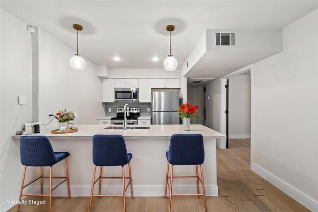 Photo - 909 Reinli St Unit 101