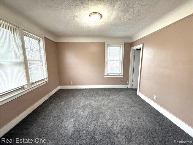 Building Photo - 4700 Curtis St Unit 2W