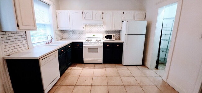 Building Photo - 6009 Kingsbury Ave Unit 1st fl