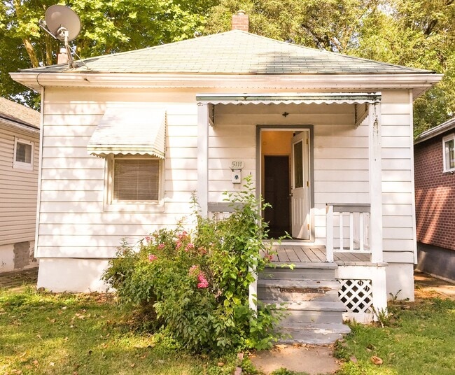 Photo - 2BR/1BA Single Family House with basement work-space and big yard!