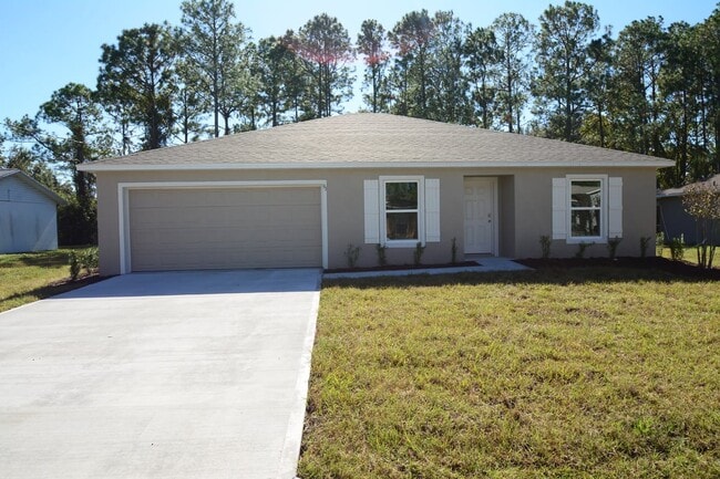 Building Photo - Charming 3-Bedroom Oasis with 2 Full Baths in Palm Coast