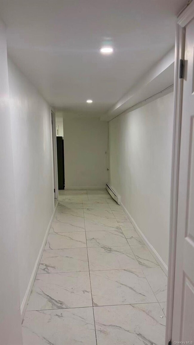 Photo - 70-51 45th Ave