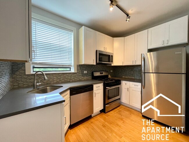 Building Photo - 2335 N Rockwell St Unit 2