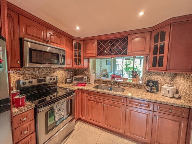 Building Photo - 3301 N Country Club Dr Unit 306