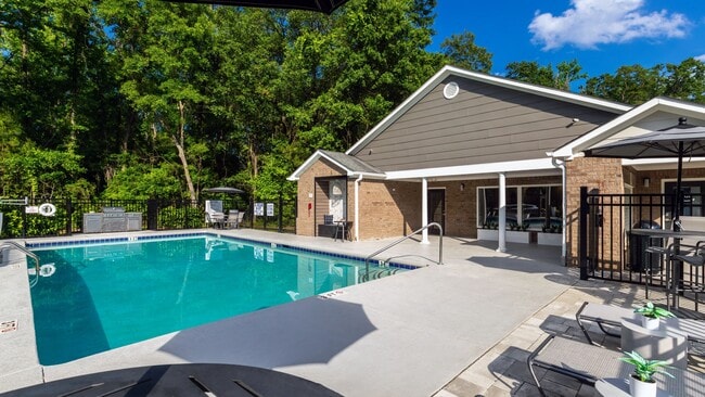 Take a dip or lounge poolside at our resort-style pool deck! - The Grays at Old Town