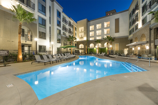 Our resort-style pool features cabanas, outdoor kitchen and spa - Joule La Floresta Apartments