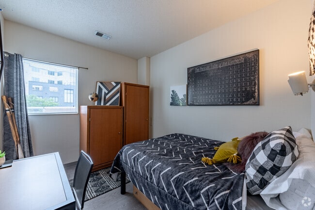 4BR, 4BA - 1,227SF - Bedroom 1 - The Quad on Delaware