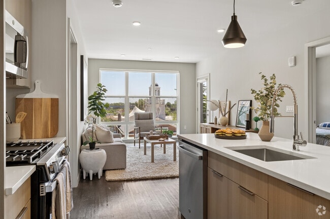 2BR, 2BA - 1,224SF - Kitchen and Living Room