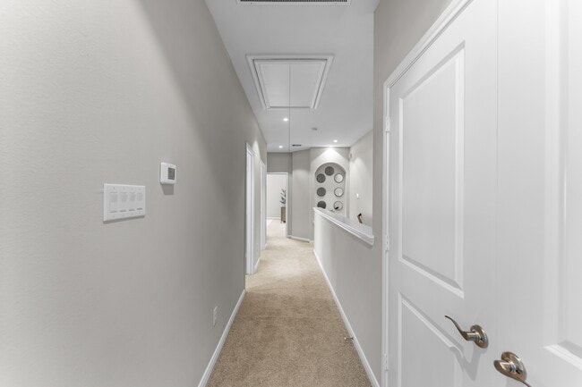 Phase II | Second Floor Hallway with Guest Bathroom and Washer/Dryer Room (Plan 4201)