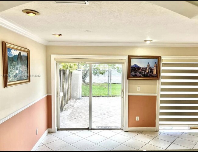 Comfort and relaxing living room features and open concept that seamlessly connect to common areas - 13918 SW 172nd Ter Casa Adosada