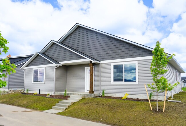 Photo - Newly built home with 3 car garage