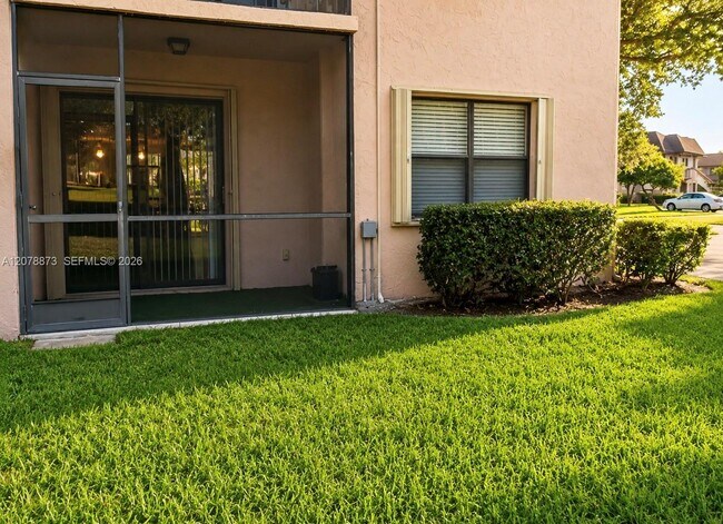 Building Photo - 10325 NW 11th St Unit 101