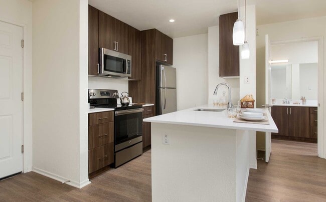 Premium Apartment Kitchen with Stainless Steel Appliances