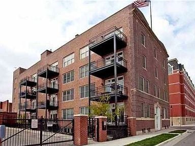 South side of building facing Interest Bank Arena. - 201 S Saint Francis Ave Unit 304 Rental