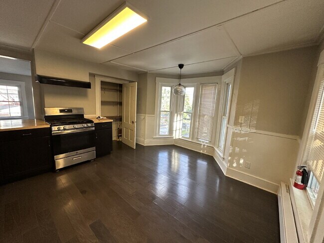 Photo - Bright & Spacious 3BR Second-Floor Apartment with 2-Story Living in Rochester!