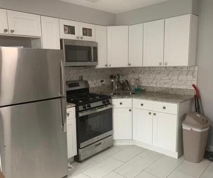 Building Photo - 4807 Hull St Unit 1W