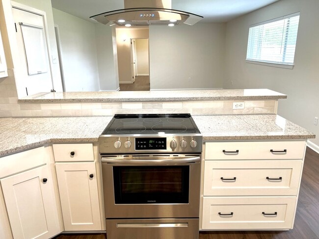 Photo - Updated 3 Bedroom Home with All Appliances & Double Garage