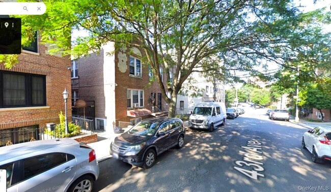 Building Photo - 61-02 43rd Ave Unit LL