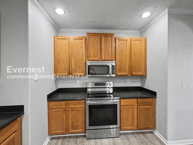 Photo - 4 Bed, 2 Bath Home with Garage / Pet-Friendly / Available Now!