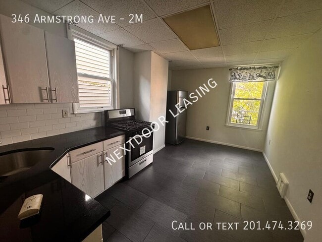 Building Photo - 346 Armstrong Ave Unit 2M