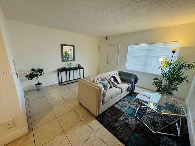 Building Photo - 1401 NW 103rd St Unit 124 Rental