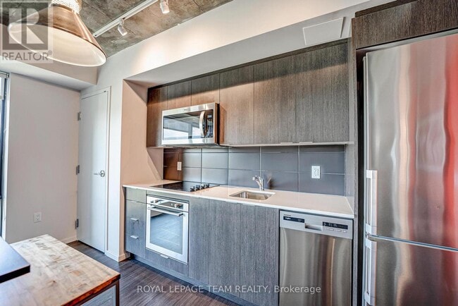 Photo - 105 Champagne Ave S Unit 703