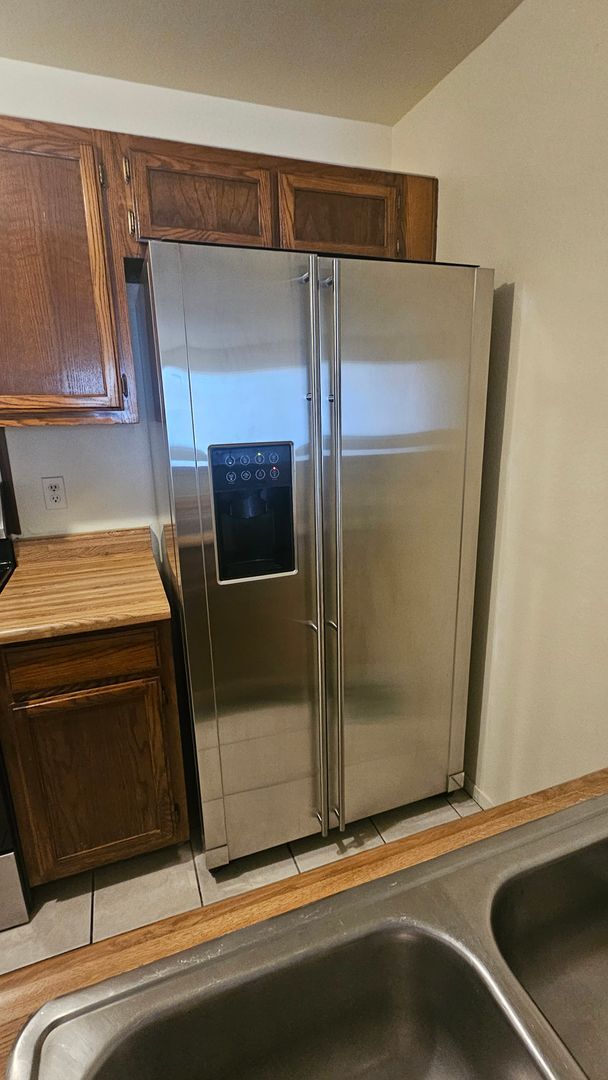 1361 E University Ave. Unit 209