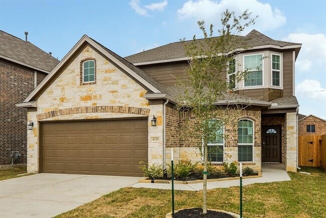 Building Photo - Beautiful stone front 4 bedroom, 3 bath home has bay windows in breakfast nook & master. It is on...