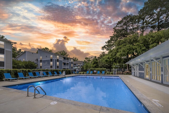 Pool Area at Village Green Apartments in Wilmington, NC