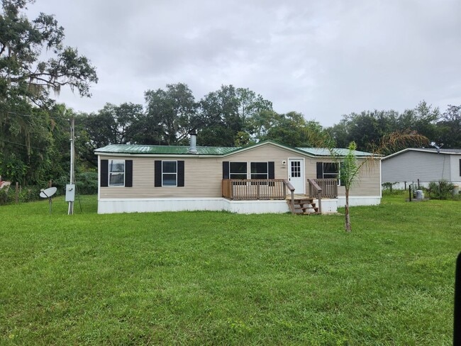 Building Photo - 3 bed, 2 bath w/ Front & Back Decks, 1/4 Acre of land, FENCED backyard