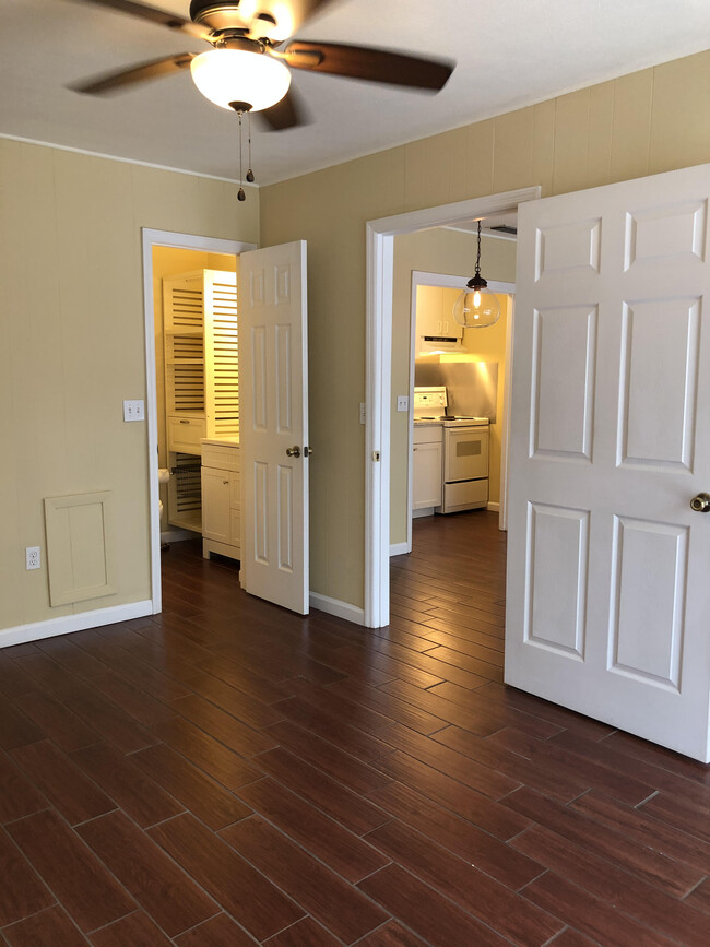 Bedroom - facing bathroom and living room - 2241 W Pensacola St Apartment Unit 65