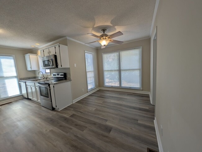 Photo - Gorgeous Brick 4 bedroom, 4 bathroom home located in the Farmwood community in Minthill!