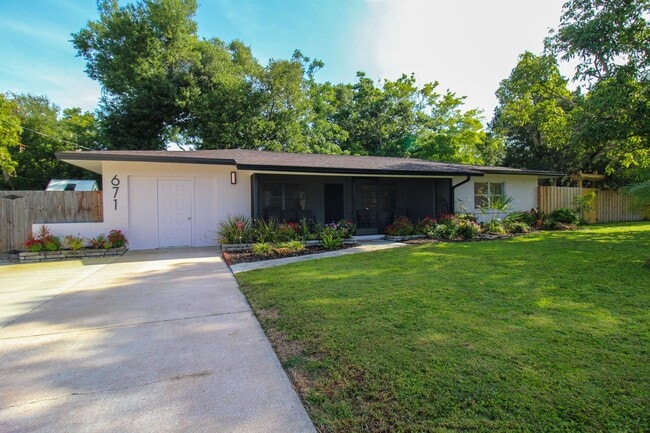 Building Photo - West of Trail Mid-Century Gem with New Designer Kitchen & Oversized Corner Lot