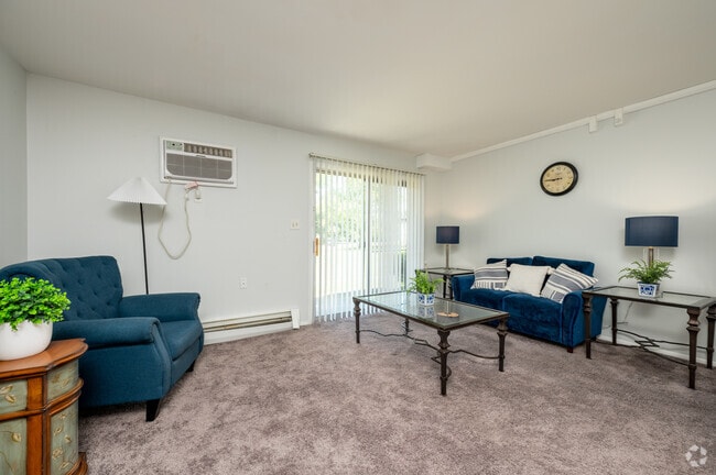 1BR, 1BA - 700SF - Living Room - Serenity Manor 55+ Independent Active Living