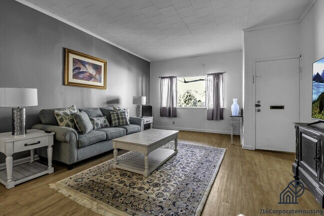 Photo - Furnished 2-Bedroom First-Floor Apartment Near Elmwood Village Unit 1