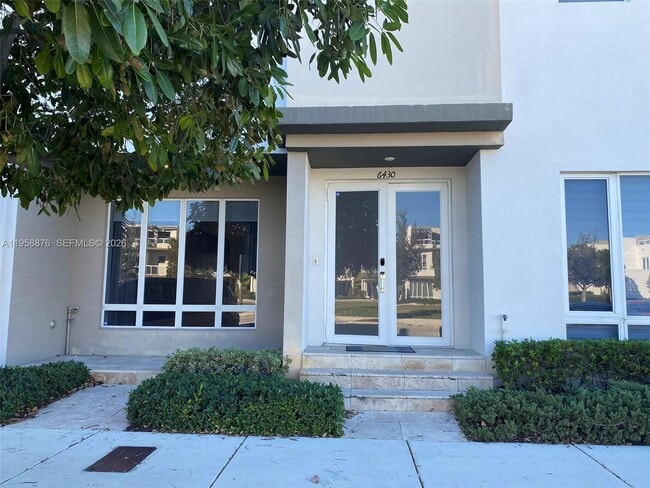 Building Photo - 6430 NW 104th Path Unit 6430