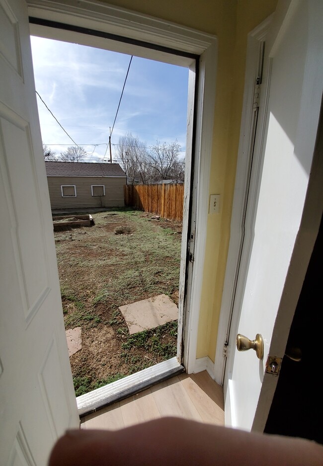 Door from large bedroom to back yard - 1917 Joliet St