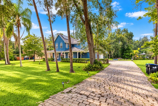 Lake Life Near Lake Nona – 4BR Home with Quartz Kitchen, Gas Fireplace & Private Backyard