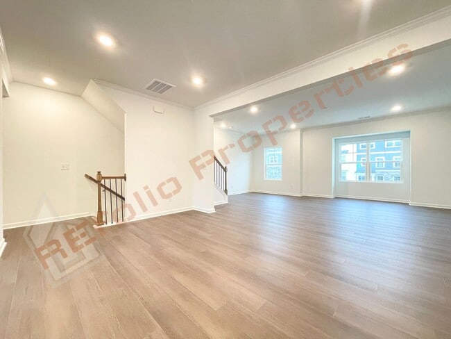 Photo - Brand New 3 Story, 4 bedroom, 3.5 bathroom Townhome Featuring a 1st floor Guest Suite, 2 Car Gara...