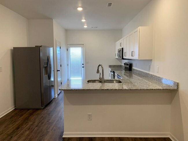 Photo - COMING SOON: Newer build in Duenweg!!   3bd/2ba with one car garage. Large primary bedroom with t...