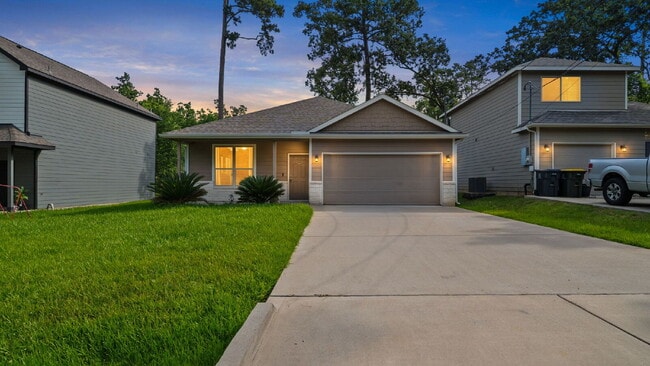 Building Photo - Welcome home to this beautifully maintained 2021 single-story home in desirable Lake Conroe Fores...