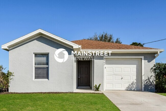 Building Photo - 3 Bedroom Pet-Friendly Home in LEHIGH ACRES, FL with Main Street Renewal